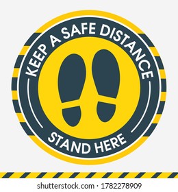 Keep a safe distance. Stand here. Sticker floor social distansing. For marking the distance between customers at checkout and in other public places. Protection from covid-19.