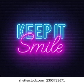 Keep it Smile neon lettering on brick wall background.