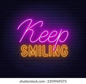 Keep Smiling neon lettering on brick wall background.