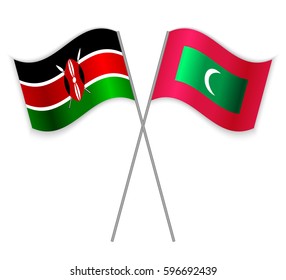 Kenyan and Maldivian crossed flags. Kenya combined with Maldives isolated on white. Language learning, international business or travel concept.