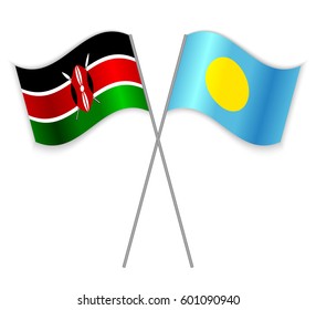 Kenyan and Palauan crossed flags. Kenya combined with Palau isolated on white. Language learning, international business or travel concept.