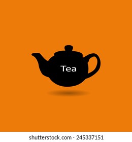 Kettle for tea on an orange background