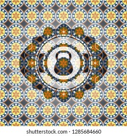 kettlebell icon inside arabesque emblem background. arabic decoration.