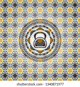 kettlebell icon inside arabic style badge. Arabesque decoration.