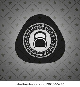 kettlebell icon inside black badge