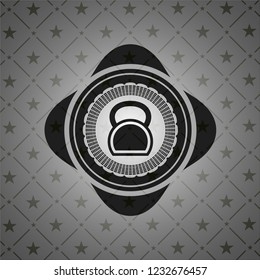 kettlebell icon inside black emblem