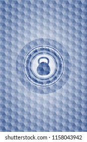 kettlebell icon inside blue emblem with geometric pattern.