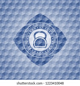 kettlebell icon inside blue emblem or badge with abstract geometric pattern background.