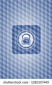 kettlebell icon inside blue emblem with geometric background.