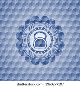 kettlebell icon inside blue polygonal emblem.