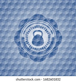 kettlebell icon inside blue polygonal badge.