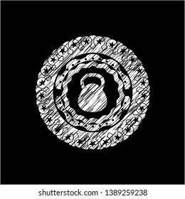 kettlebell icon inside chalkboard emblem