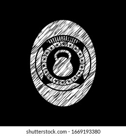 ícono de timbre dentro del emblema de pizarra negra