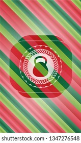 kettlebell icon inside christmas colors style badge.