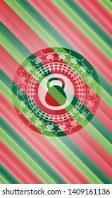 kettlebell icon inside christmas colors emblem.