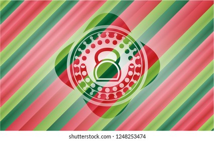 kettlebell icon inside christmas emblem.