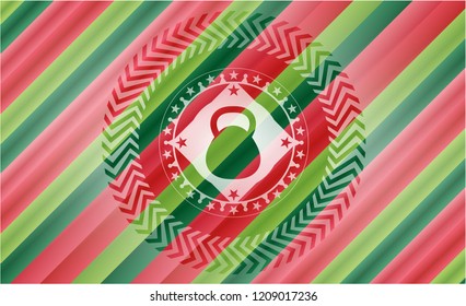 kettlebell icon inside christmas style emblem.