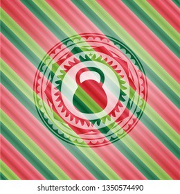 kettlebell icon inside christmas style badge..