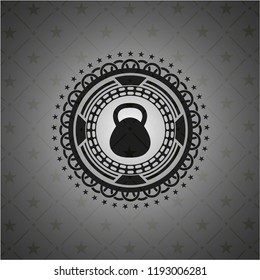 kettlebell icon inside dark badge or emblem