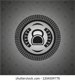 kettlebell icon inside dark badge