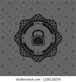 kettlebell icon inside dark badge