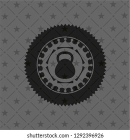 kettlebell icon inside dark badge or emblem