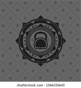 kettlebell icon inside dark badge or emblem