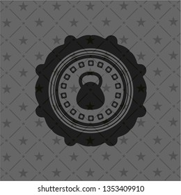 kettlebell icon inside dark badge or emblem