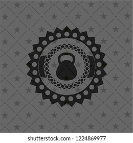 kettlebell icon inside dark emblem