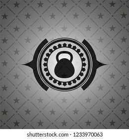 kettlebell icon inside dark emblem