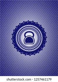 kettlebell icon inside denim background