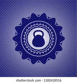 kettlebell icon inside emblem with jean high quality background