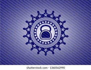 kettlebell icon inside emblem with jean texture