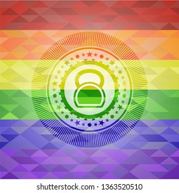 kettlebell icon inside emblem on mosaic background with the colors of the LGBT flag
