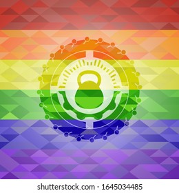 kettlebell icon inside emblem on mosaic background with the colors of the LGBT flag