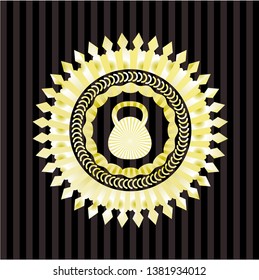 kettlebell icon inside gold shiny emblem