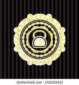kettlebell icon inside gold shiny emblem