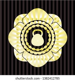 kettlebell icon inside golden badge