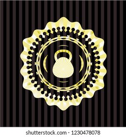 kettlebell icon inside golden emblem or badge