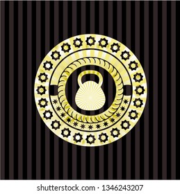 kettlebell icon inside golden emblem or badge