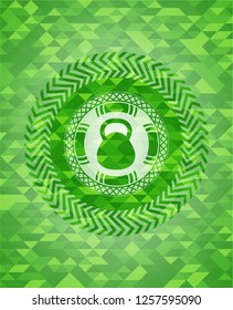 kettlebell icon inside green emblem. Mosaic background