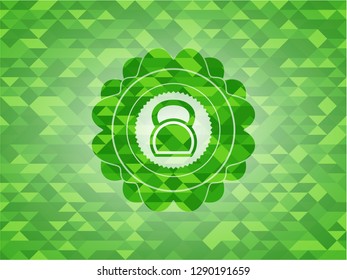 kettlebell icon inside green emblem with mosaic ecological style background