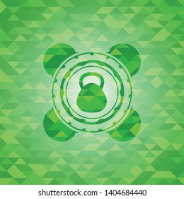 kettlebell icon inside green emblem with mosaic ecological style background