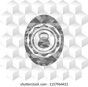 kettlebell icon inside grey badge with geometric cube white background