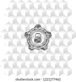 kettlebell icon inside grey icon or emblem with geometric cube white background