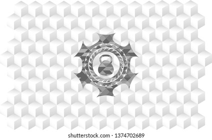 kettlebell icon inside grey emblem with geometric cube white background