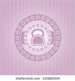 kettlebell icon inside pink icon or emblem