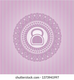 kettlebell icon inside pink emblem
