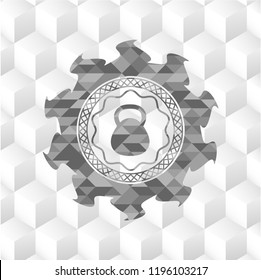kettlebell icon inside realistic grey emblem with cube white background
