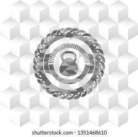 kettlebell icon inside realistic grey emblem with cube white background